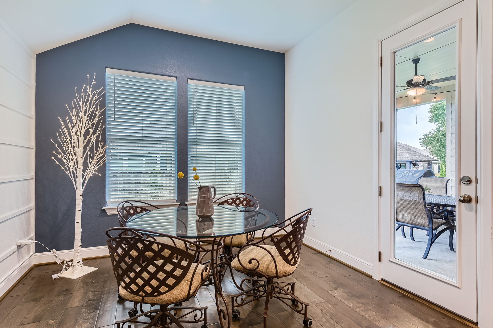 1332 Modoc Way Kyle, TX 78640 - Photo 12 of 28 a dining room with furniture and wooden floor