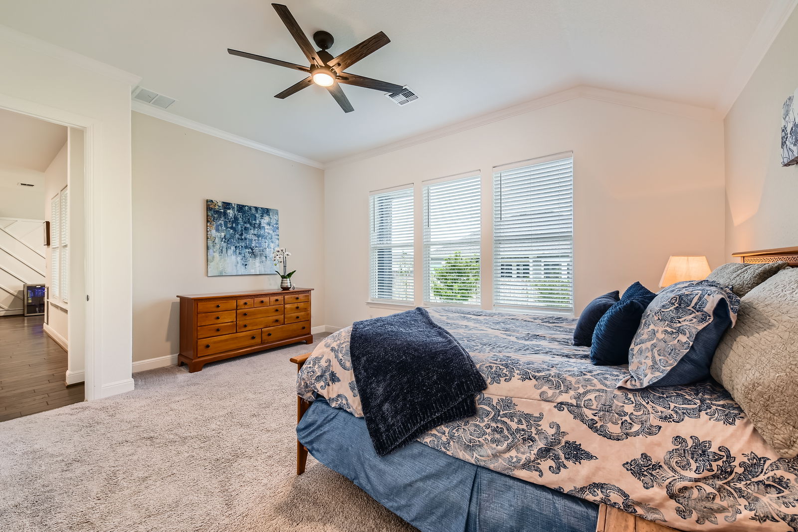 1332 Modoc Way Kyle, TX 78640 - Photo 15 of 28 a bedroom with a bed a couch and a window