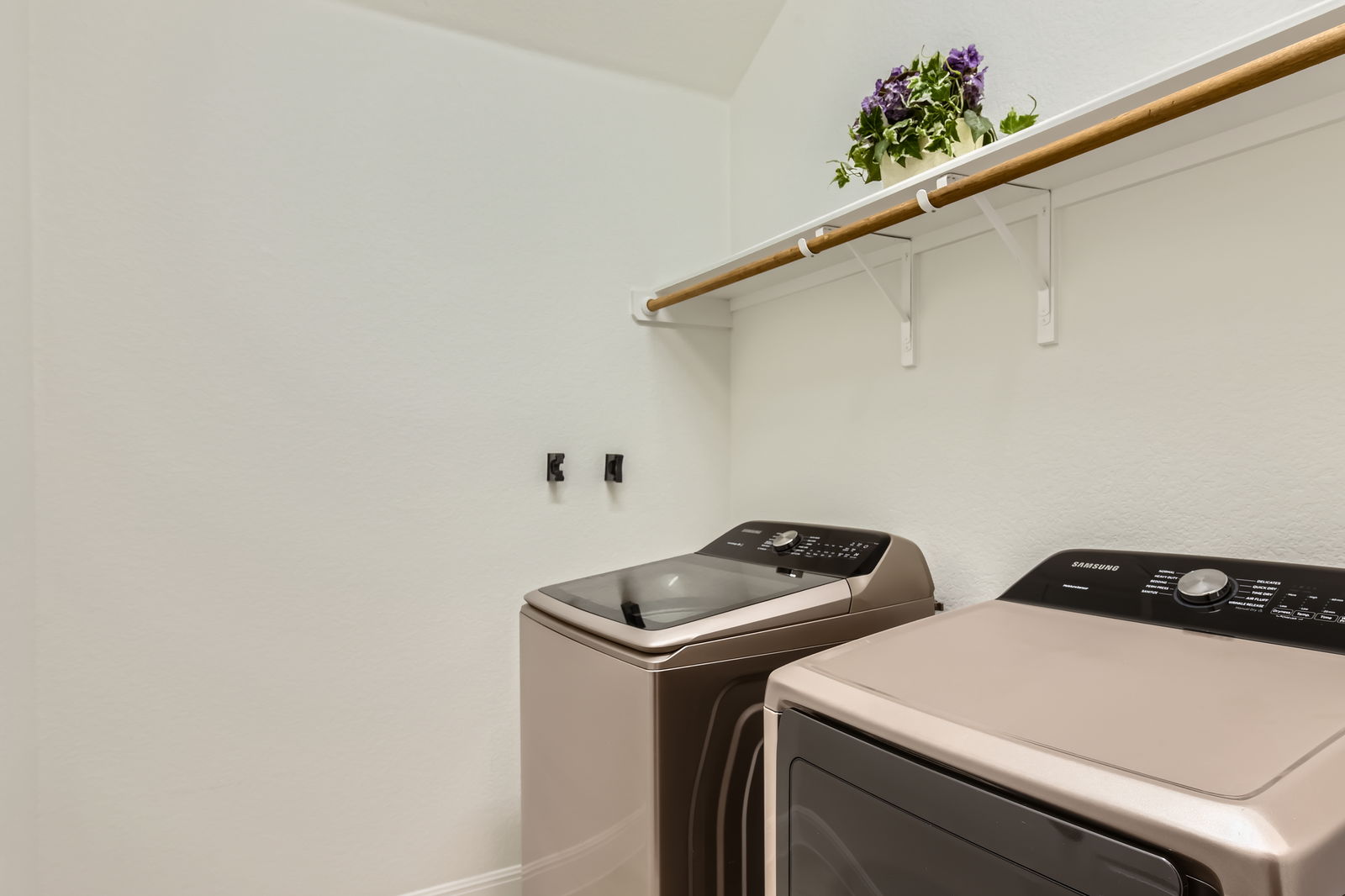 1332 Modoc Way Kyle, TX 78640 - Photo 23 of 28 a utility room with dryer and washer
