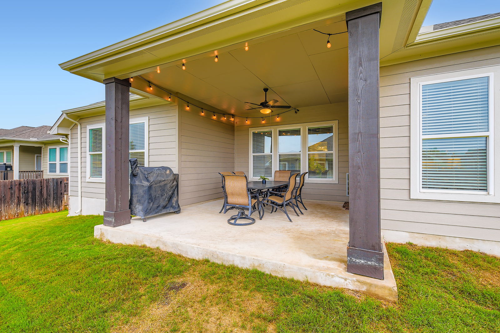 1332 Modoc Way Kyle, TX 78640 - Photo 26 of 28 a view of backyard with a patio and a garden