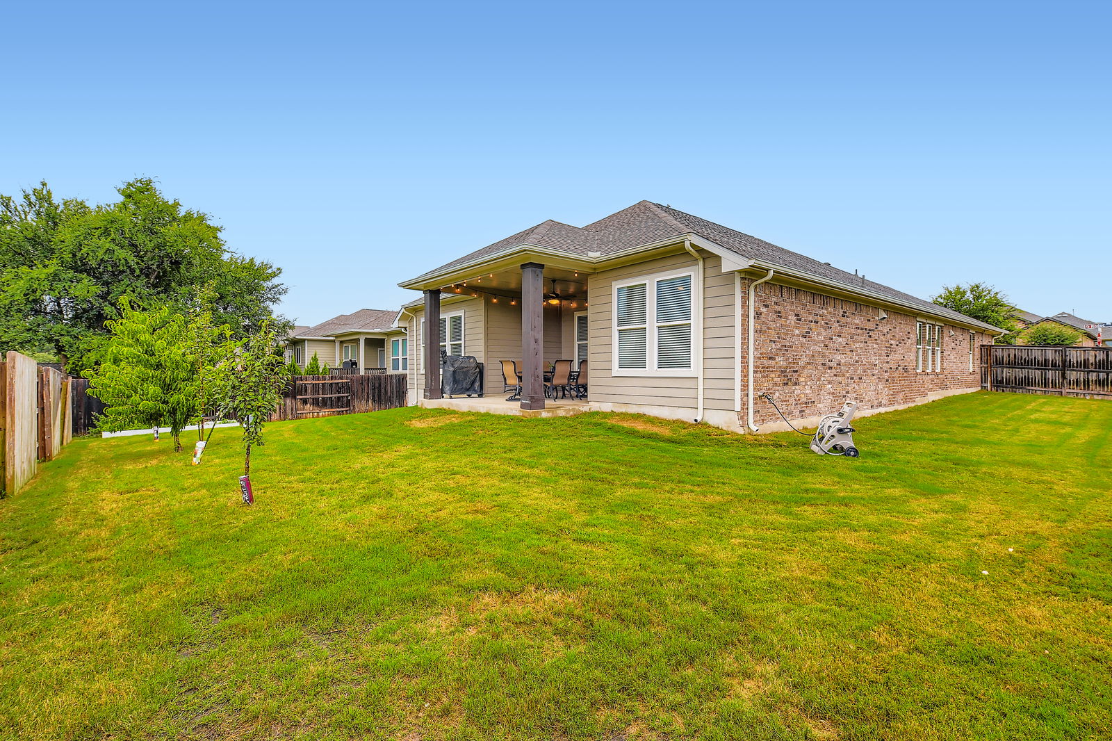1332 Modoc Way Kyle, TX 78640 - Photo 27 of 28 a front view of a house with garden