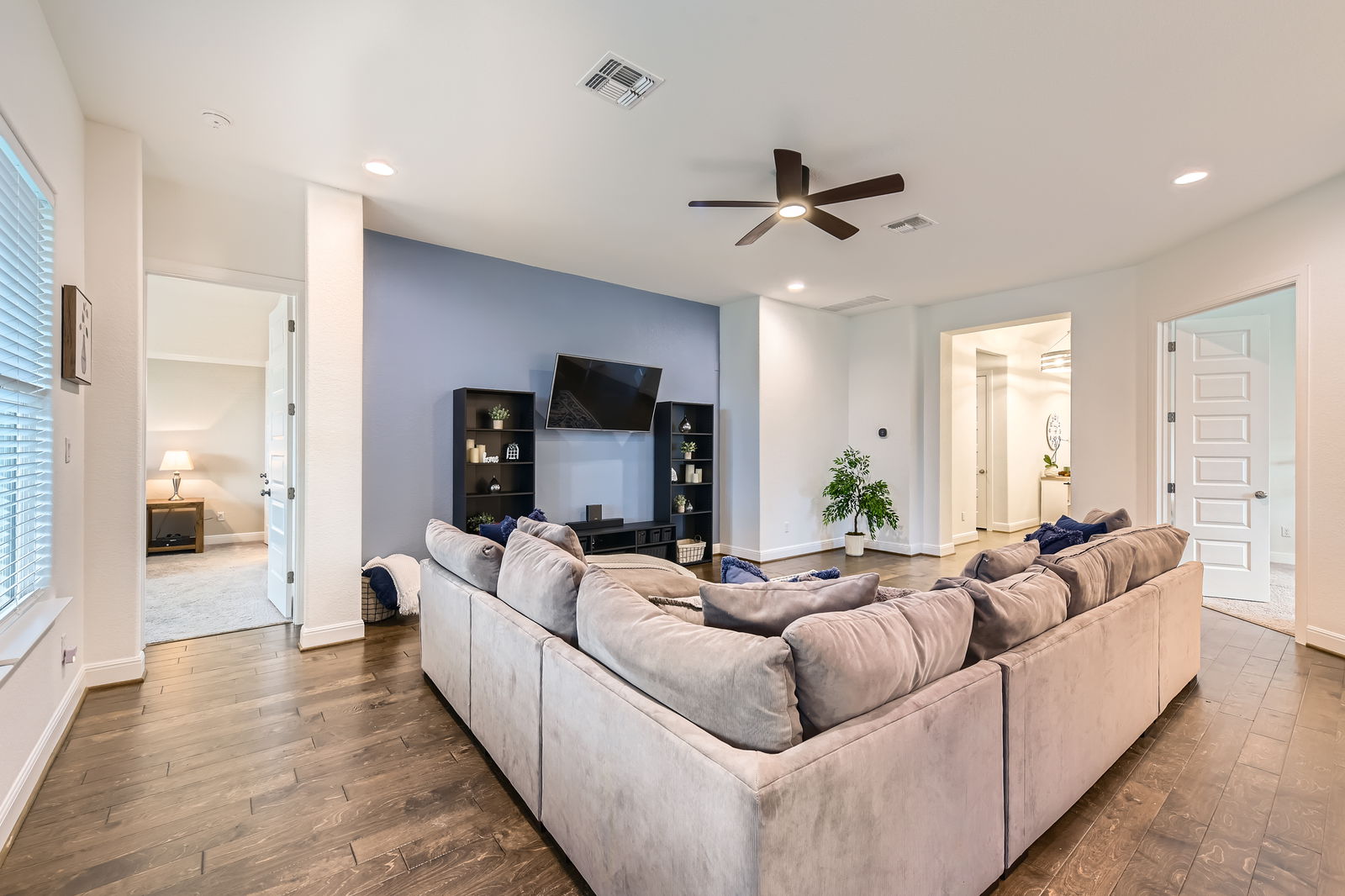 1332 Modoc Way Kyle, TX 78640 - Photo 8 of 28 a living room with furniture and a flat screen tv