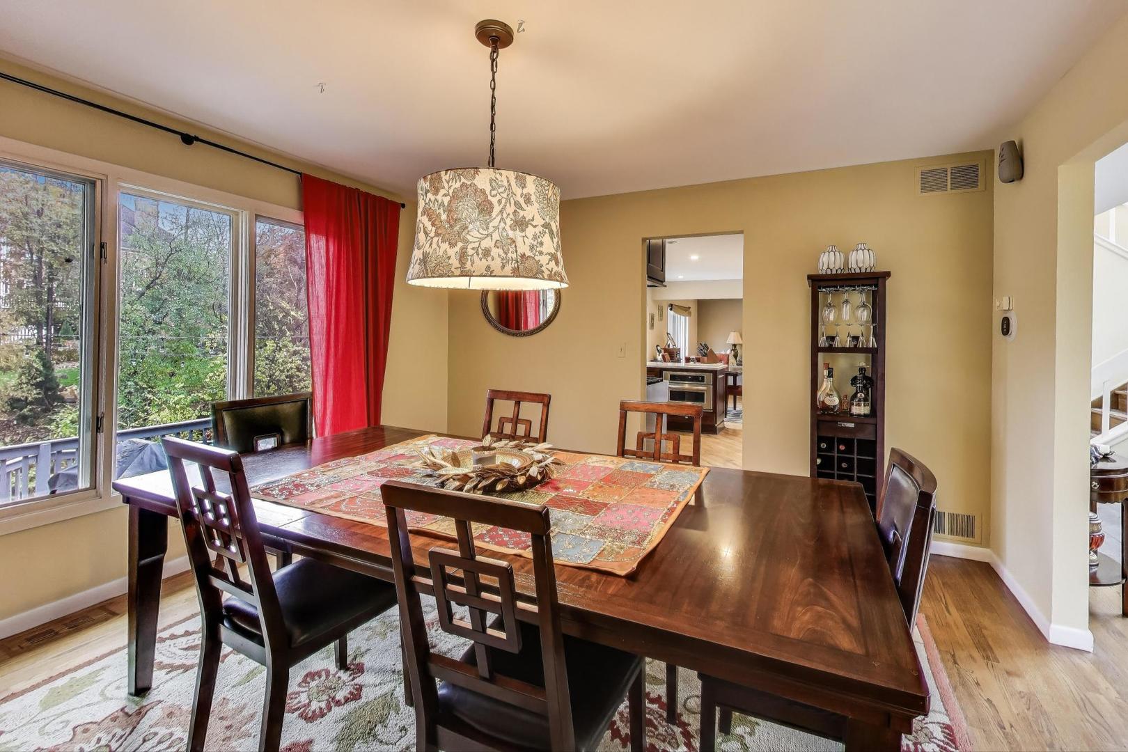 11515 Burr Oak Lane Burr Ridge, IL 60527 - Photo 11 of 73 a view of a dining room with furniture window and outside view