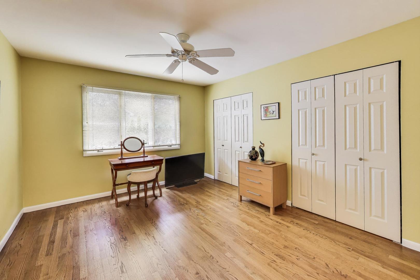 11515 Burr Oak Lane Burr Ridge, IL 60527 - Photo 33 of 73 a living room with furniture and a wooden floor