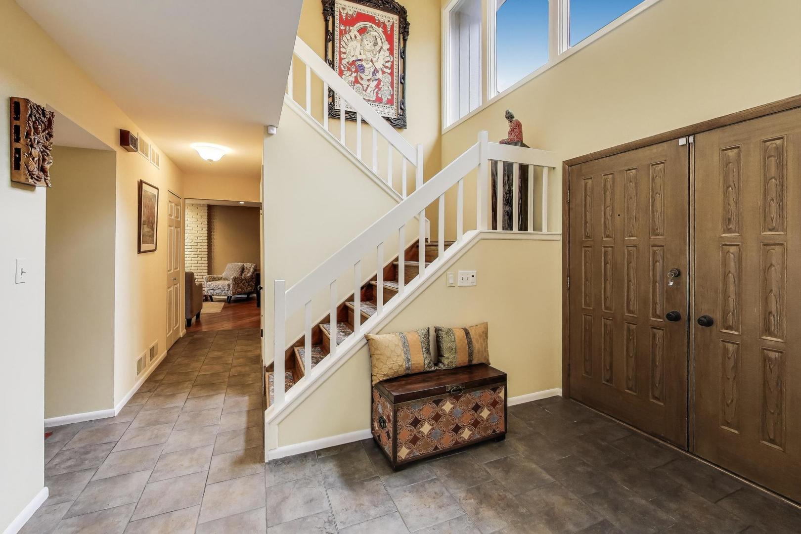 11515 Burr Oak Lane Burr Ridge, IL 60527 - Photo 4 of 73 a view of entryway with stairs and furniture