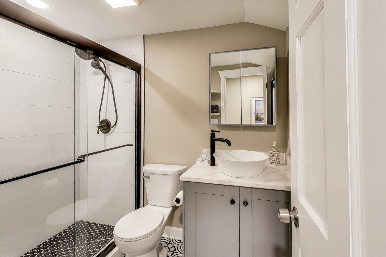11515 Burr Oak Lane Burr Ridge, IL 60527 - Photo 46 of 73 a bathroom with a sink toilet and shower