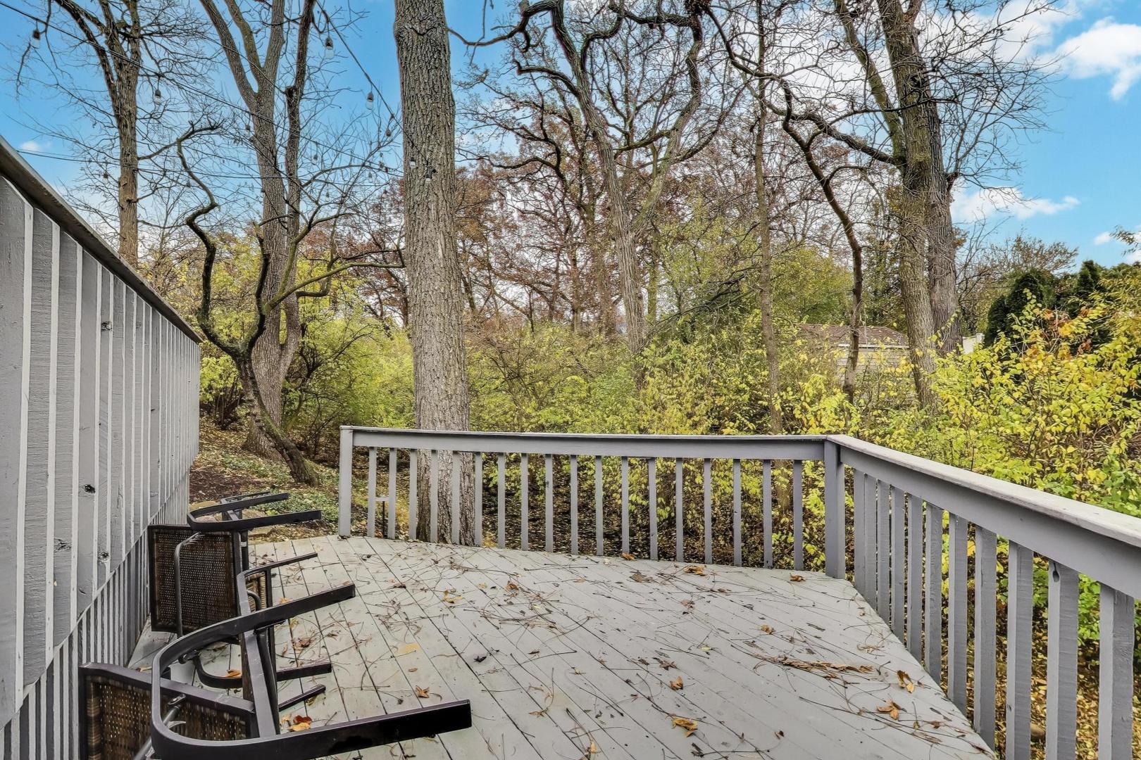 11515 Burr Oak Lane Burr Ridge, IL 60527 - Photo 51 of 73 a view of a two chair in the balcony