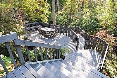 11515 Burr Oak Lane Burr Ridge, IL 60527 - Photo 64 of 73 a view of a balcony with wooden floor