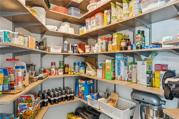 a room with furniture and window