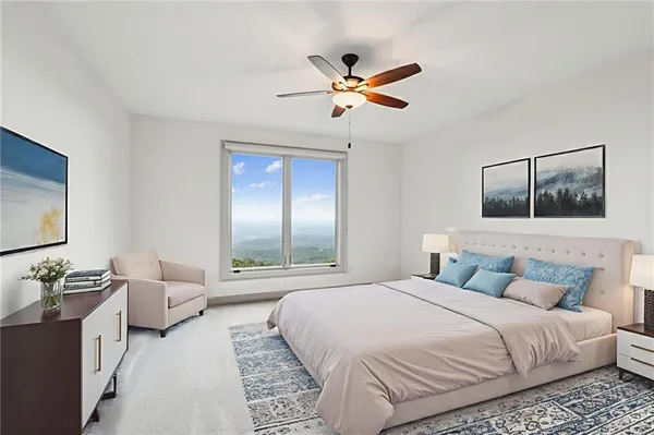 a view of lake with mountain in the background