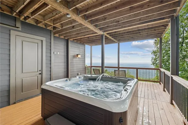 a room with gym equipment and a view of living room