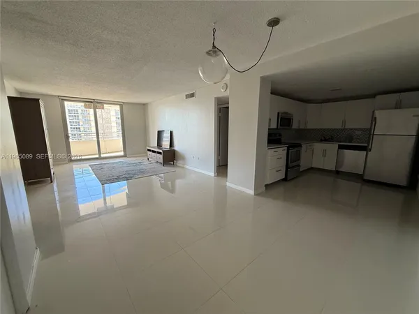 a view of a livingroom with a furniture