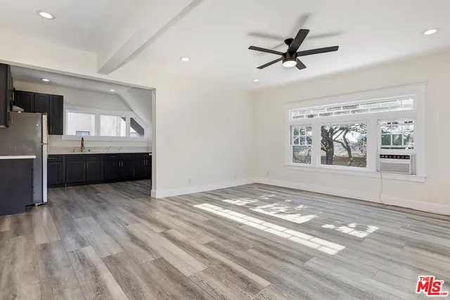 a view of a livingroom with a flat screen tv