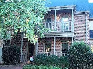 3318 Ridgecrest Court Raleigh, NC 27607 - Photo 1 of 1 a front view of a house with garden
