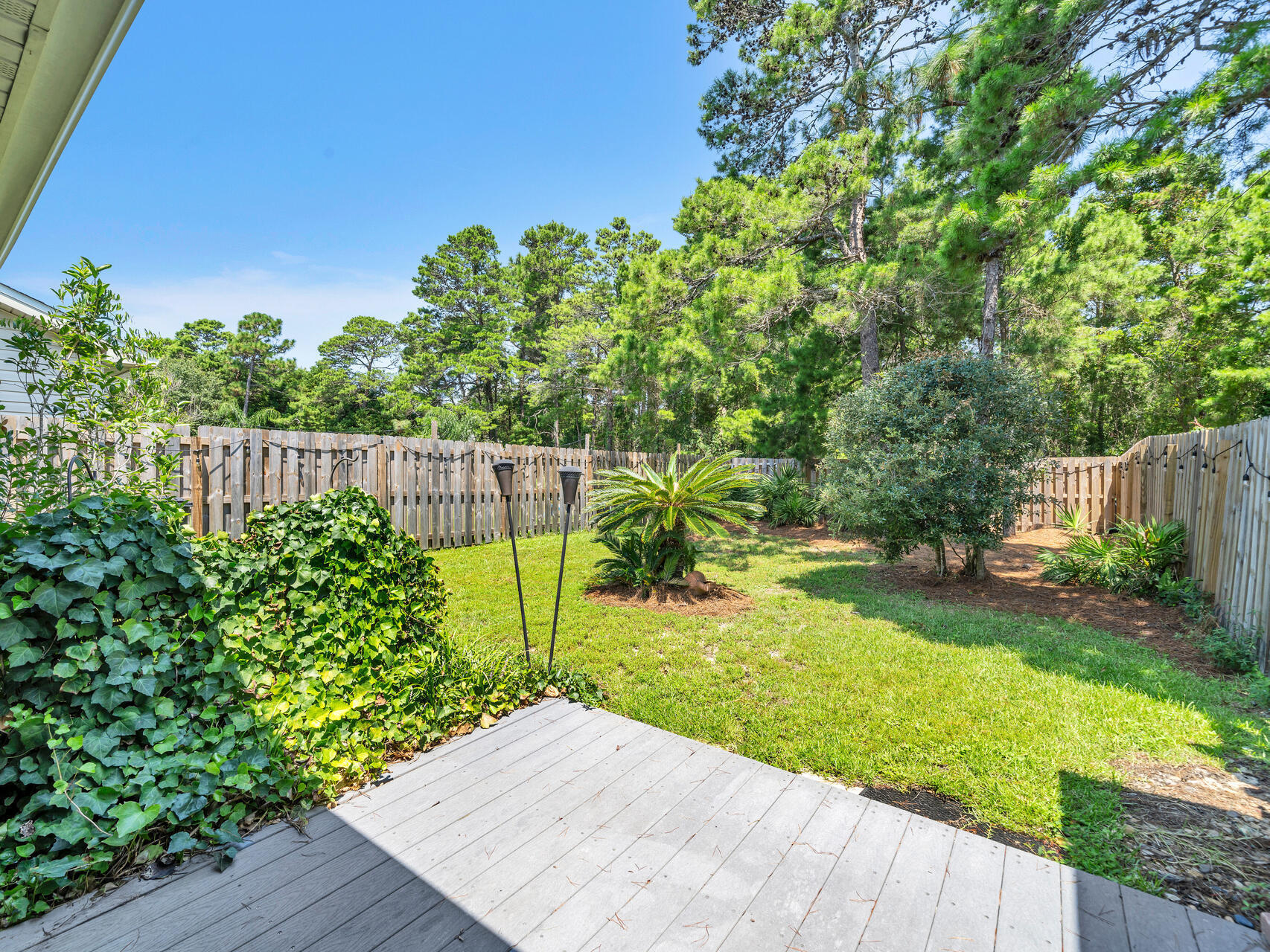 204 Vía Largo, Unit 29B Santa Rosa Beach, FL 32459 - Photo 33 of 40 a view of a backyard with wooden fence
