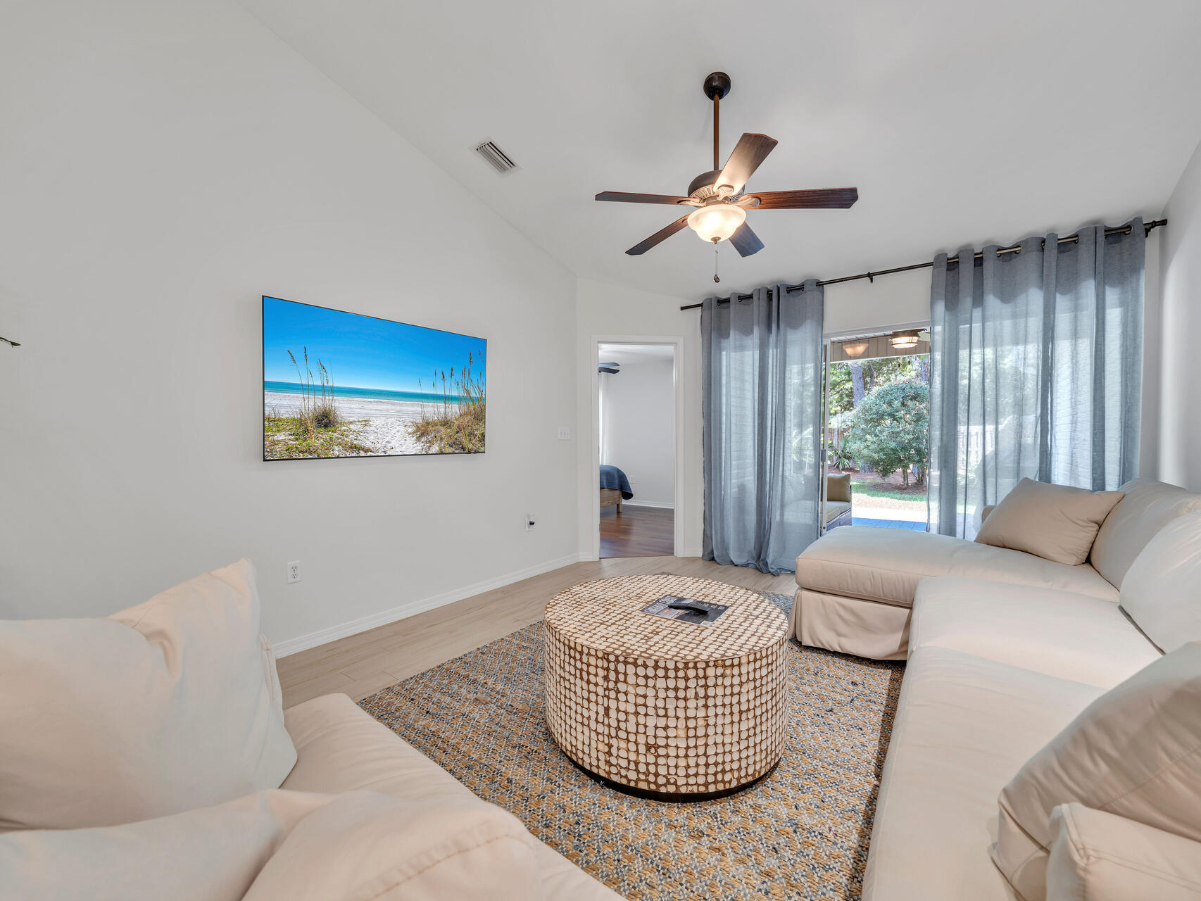 204 Vía Largo, Unit 29B Santa Rosa Beach, FL 32459 - Photo 9 of 40 a living room with furniture and window
