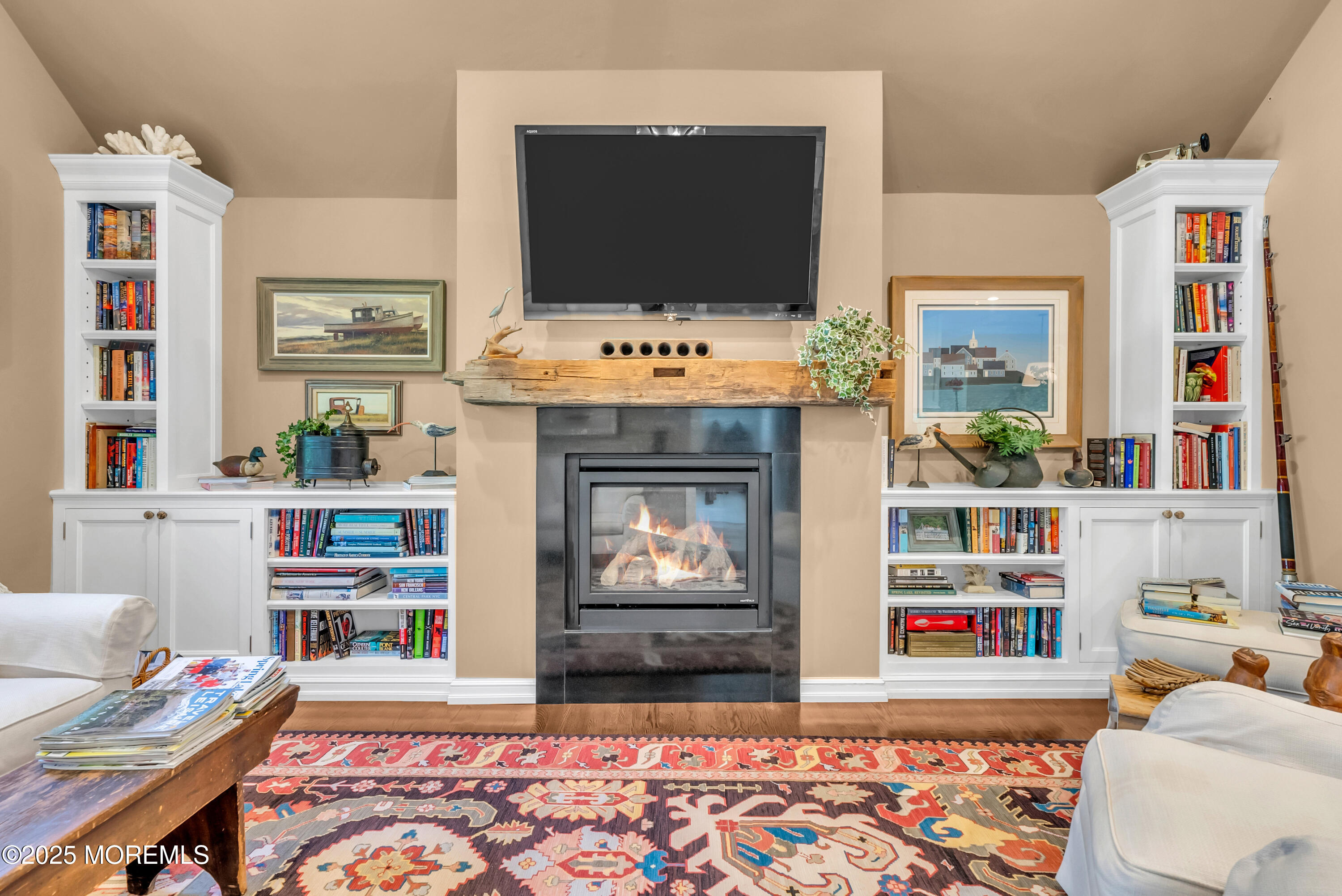 202 Ludlow Avenue Spring Lake, NJ 07762 - Photo 42 of 99 a living room with furniture and a flat screen tv