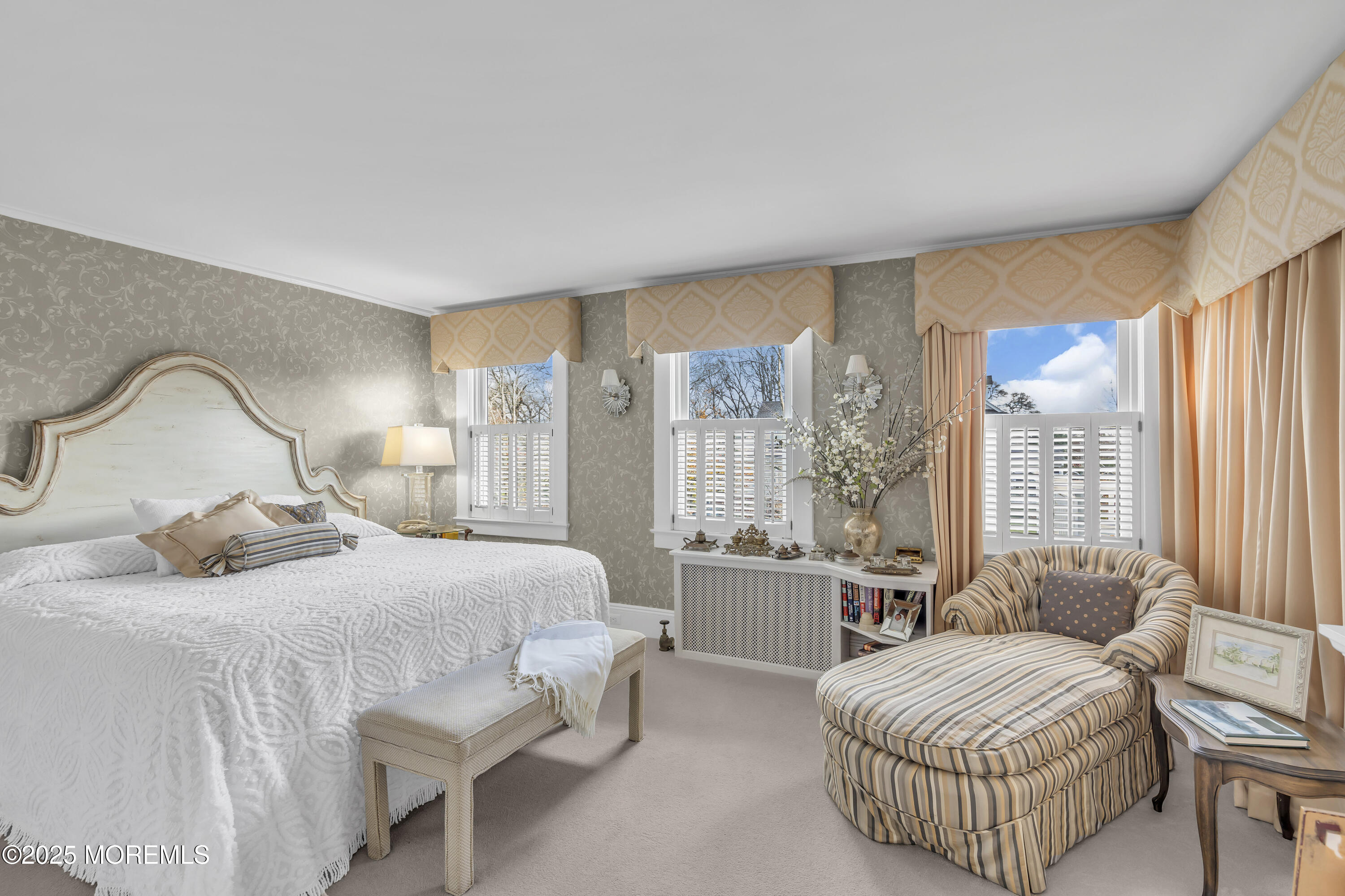 202 Ludlow Avenue Spring Lake, NJ 07762 - Photo 52 of 99 a bedroom with a bed and a large window