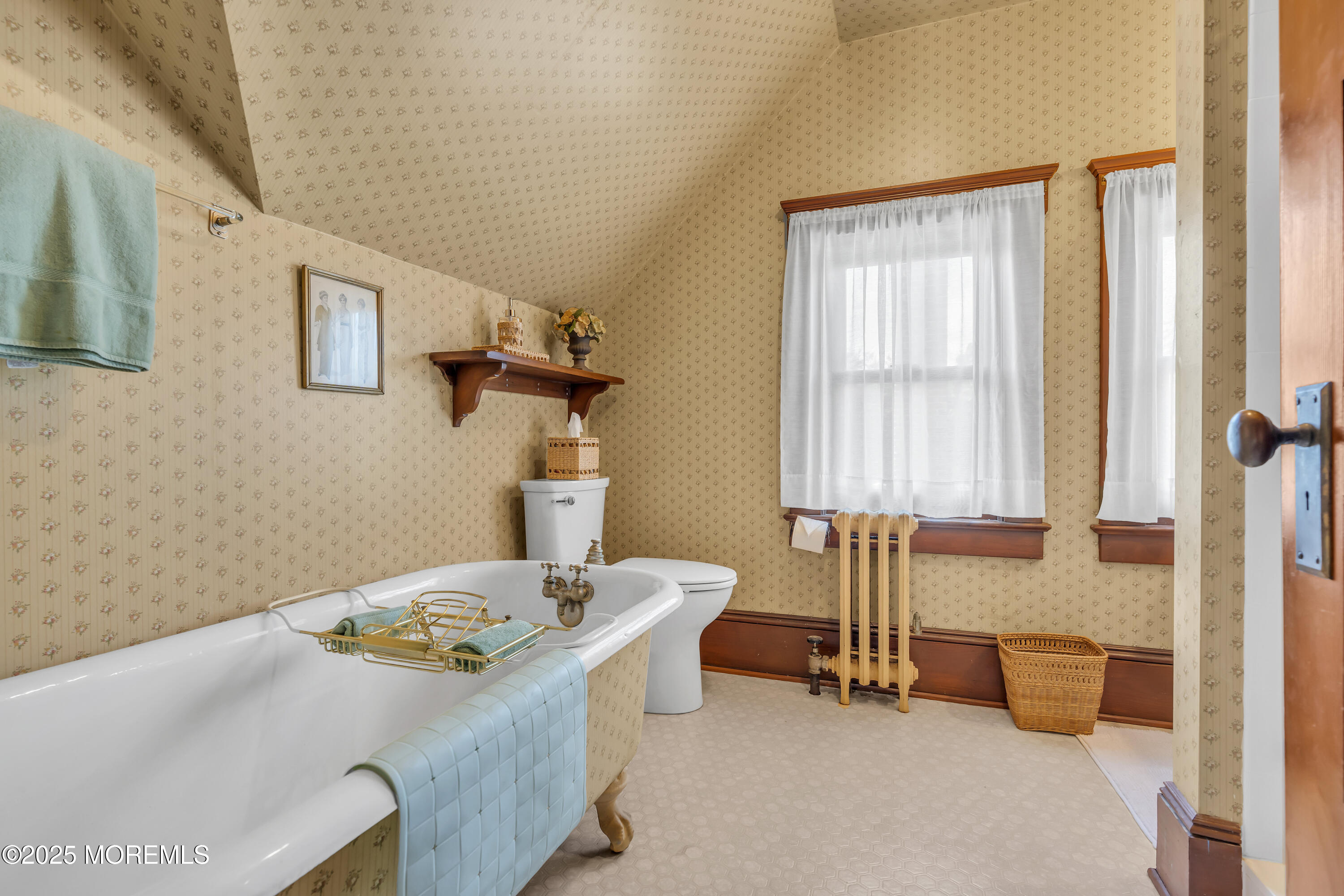 202 Ludlow Avenue Spring Lake, NJ 07762 - Photo 71 of 99 a bedroom with a bed and a table in it