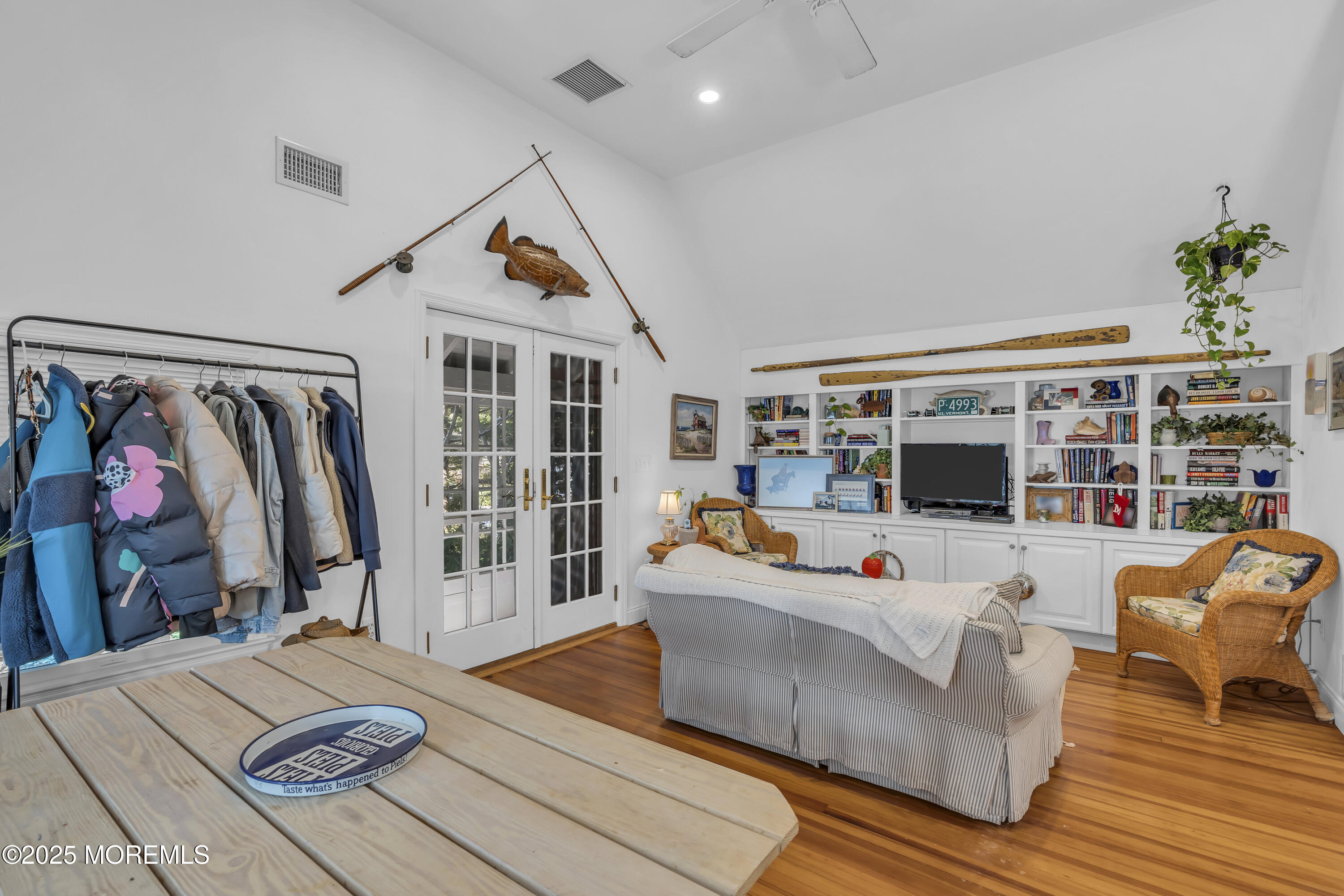 202 Ludlow Avenue Spring Lake, NJ 07762 - Photo 83 of 99 a living room with furniture and a floor to ceiling window