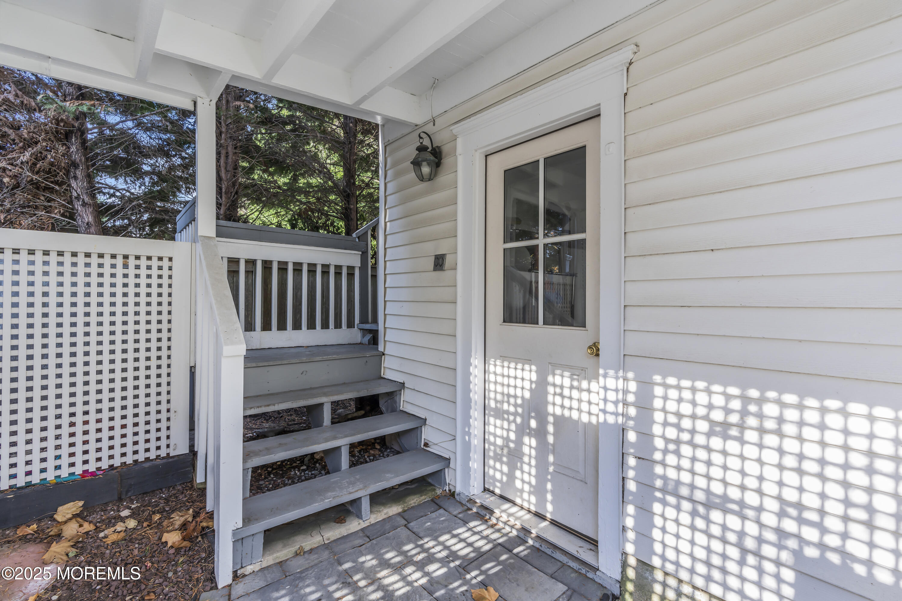 202 Ludlow Avenue Spring Lake, NJ 07762 - Photo 97 of 99 a view of a balcony with a swing