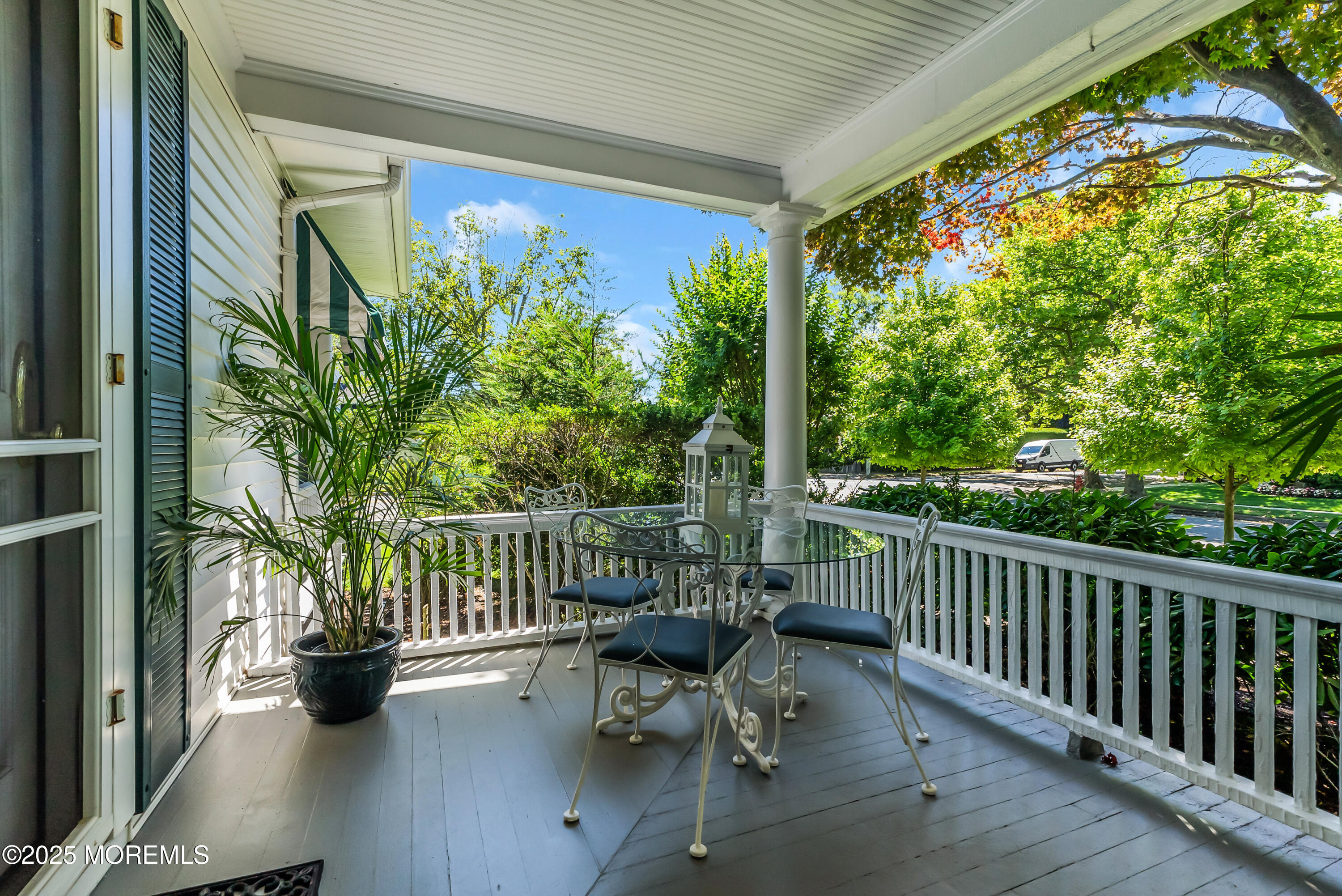 202 Ludlow Avenue Spring Lake, NJ 07762 - Photo 10 of 99 a view of balcony with wooden floor and outdoor seating