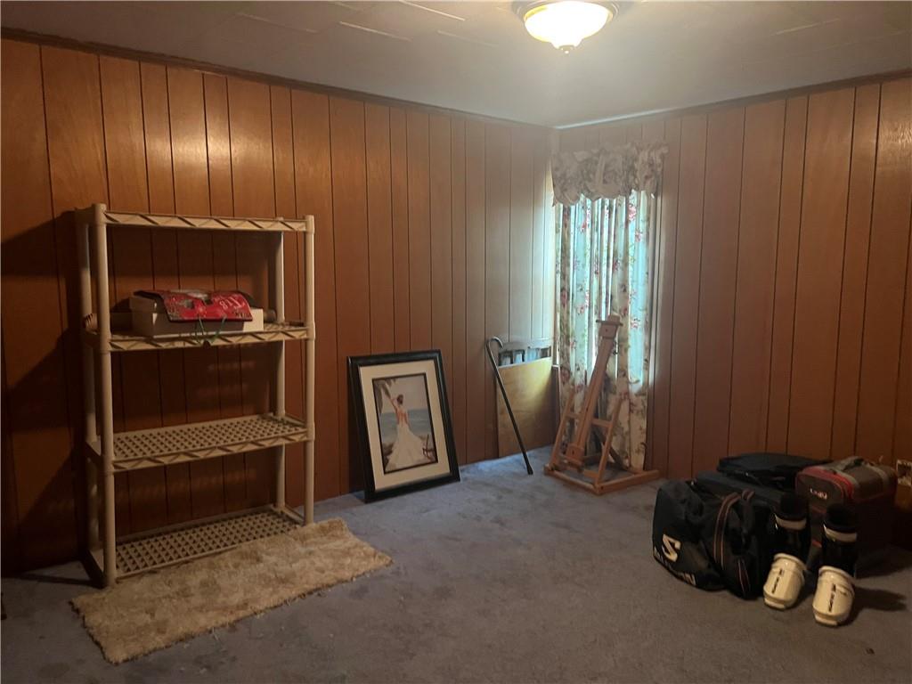 209-211 Old School Road Luxor, PA 15662 - Photo 18 of 27 a room with furniture and a window