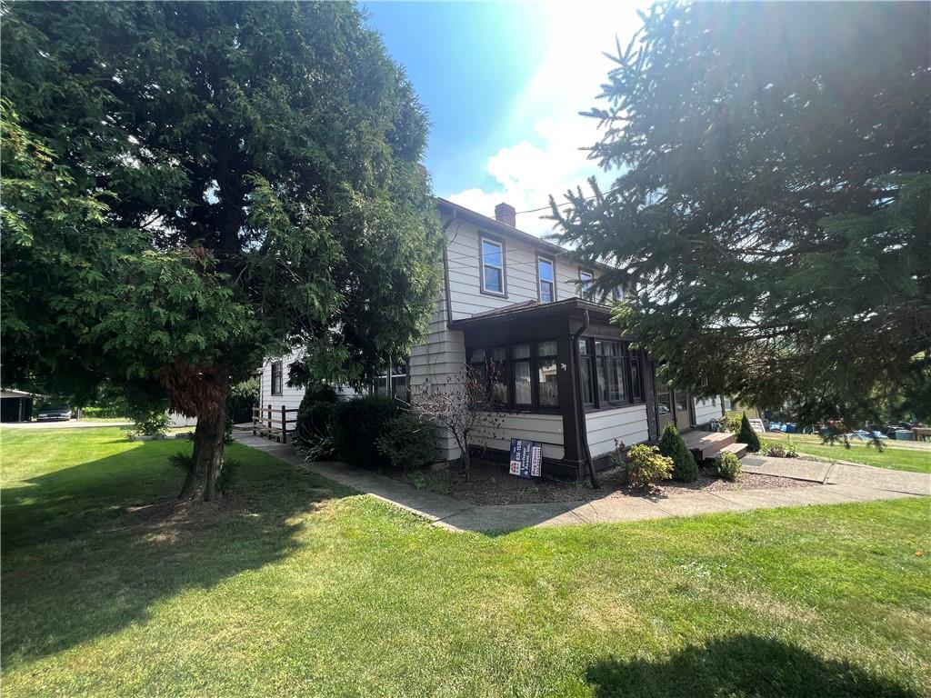 209-211 Old School Road Luxor, PA 15662 - Photo 2 of 27 a view of a house with swimming pool and sitting area