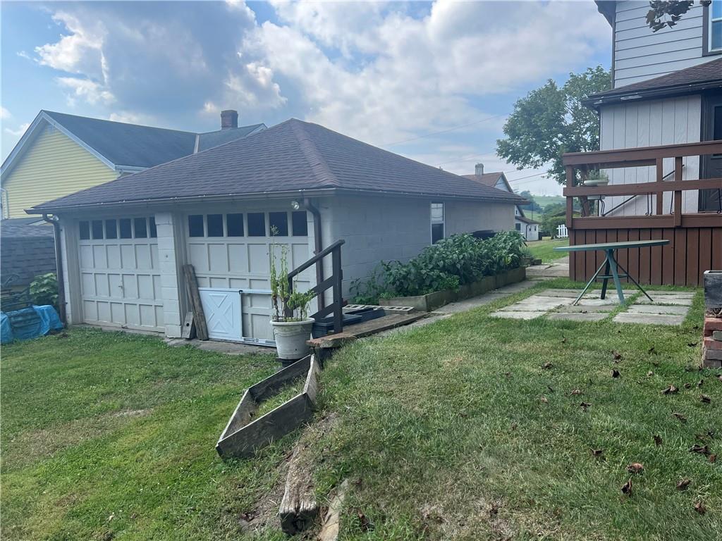 209-211 Old School Road Luxor, PA 15662 - Photo 25 of 27 a house view with a garden space