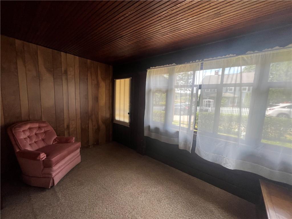 209-211 Old School Road Luxor, PA 15662 - Photo 6 of 27 a living room with furniture and a gate