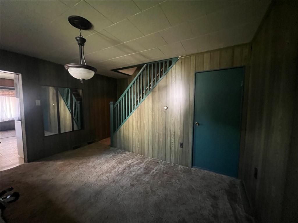 209-211 Old School Road Luxor, PA 15662 - Photo 7 of 27 a view of a hallway with a chandelier fan