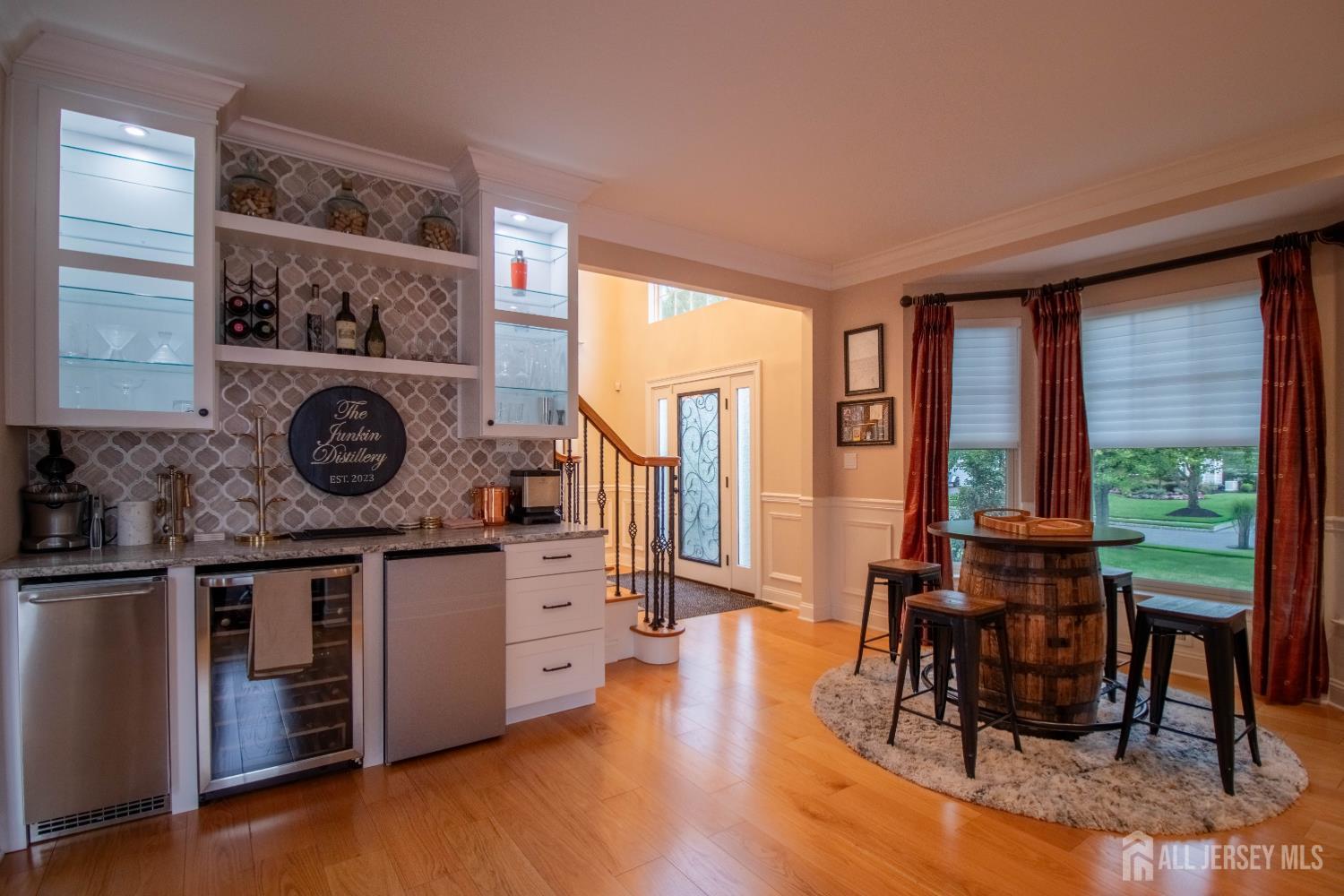 9 Pondview Drive Tinton Falls, NJ 07724 - Photo 7 of 41 a kitchen with stainless steel appliances granite countertop a stove and a refrigerator