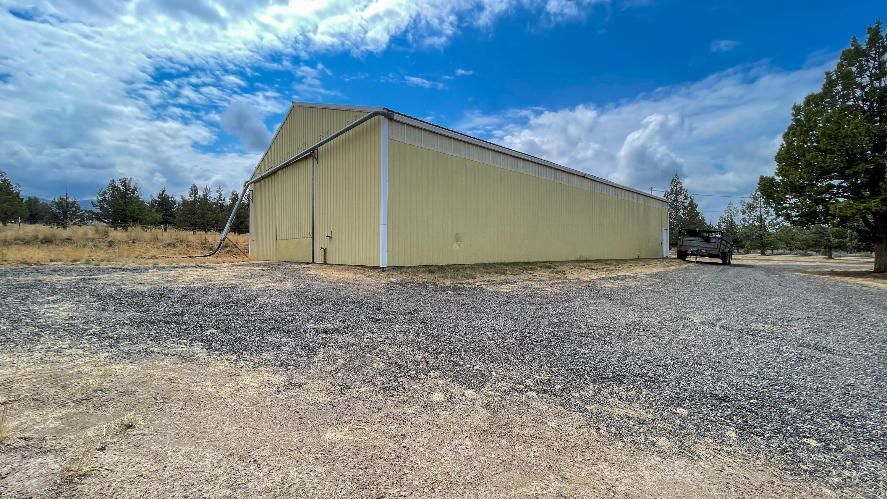 6302 Stillman Road Powell Butte, OR 97753 - Photo 7 of 39 a view of an empty room with a yard