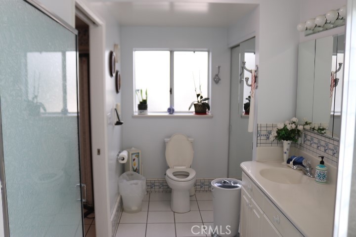 33975 Wright Road Wildomar, CA 92595 - Photo 42 of 70 a bathroom with a sink toilet and shower