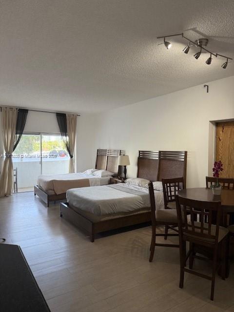 500 Bayview Drive, Unit 125 Sunny Isles Beach, FL 33160 - Photo 5 of 19 a living room with furniture and a large window