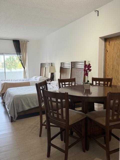 500 Bayview Drive, Unit 125 Sunny Isles Beach, FL 33160 - Photo 8 of 19 a view of a dining room with furniture window and outside view