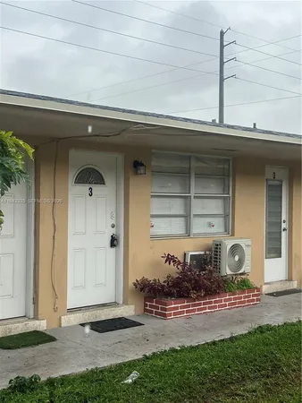 a front view of a house with a porch
