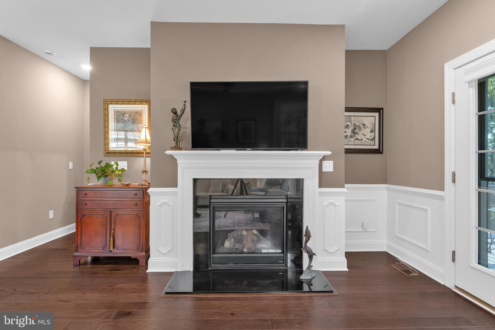 66 Butler Drive Barnegat, NJ 08005 - Photo 17 of 49 a living room with furniture and a fireplace