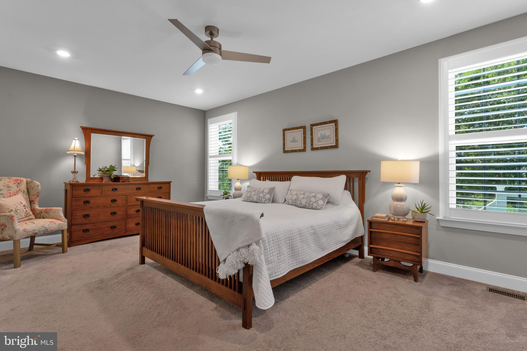 66 Butler Drive Barnegat, NJ 08005 - Photo 21 of 49 a spacious bedroom with a bed and a couch