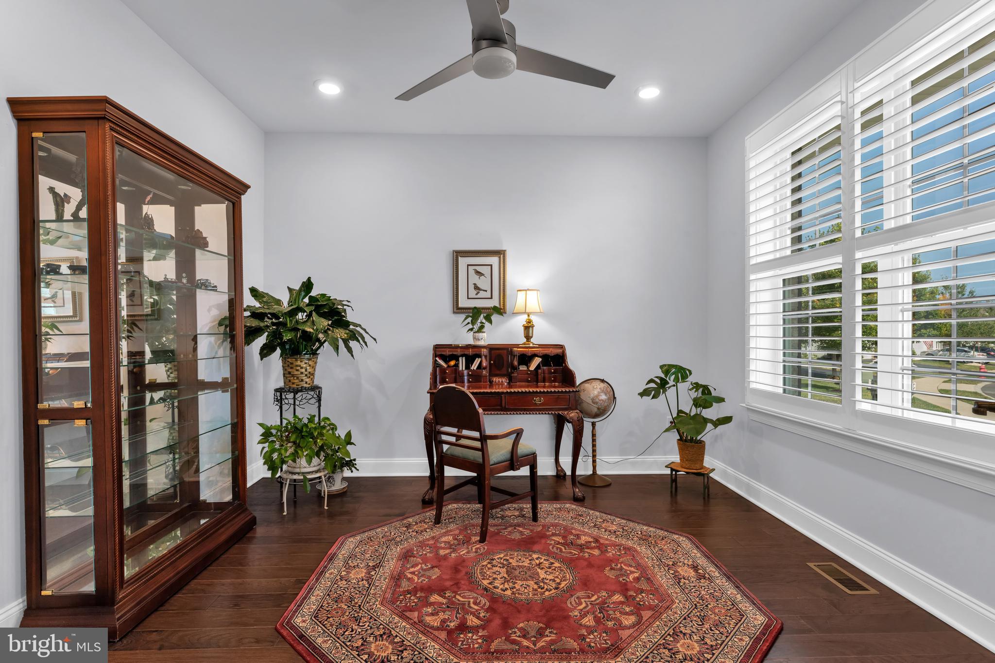 66 Butler Drive Barnegat, NJ 08005 - Photo 3 of 49 a living room with furniture and a potted plant