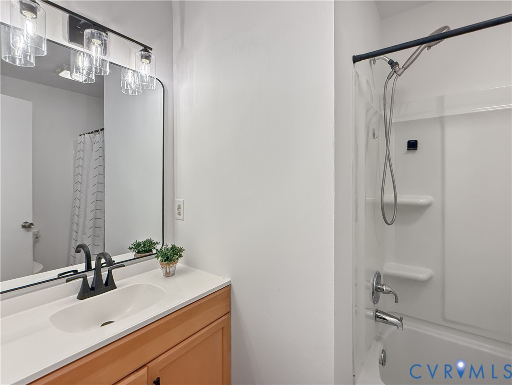 3203 Roland View Terrace Chester, VA 23831 - Photo 16 of 19 Integrated vanity with a single basin sink, matte