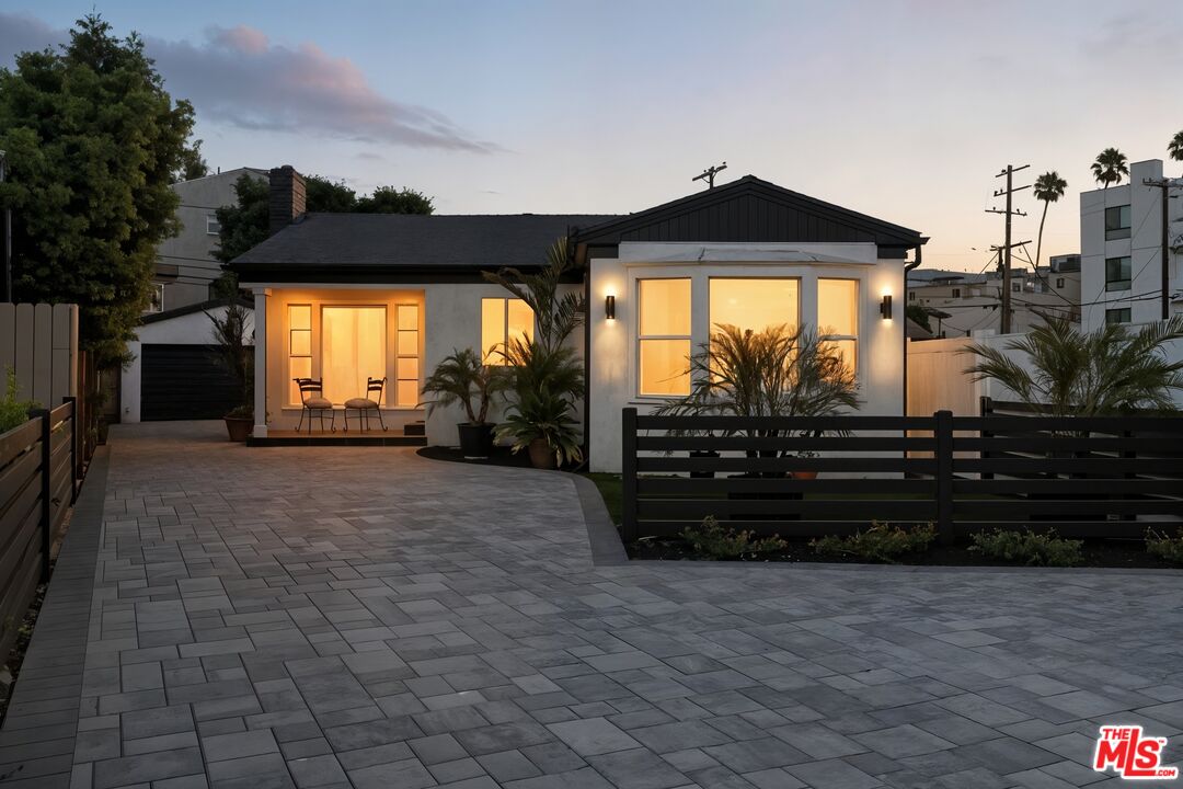 a view of a house with a porch