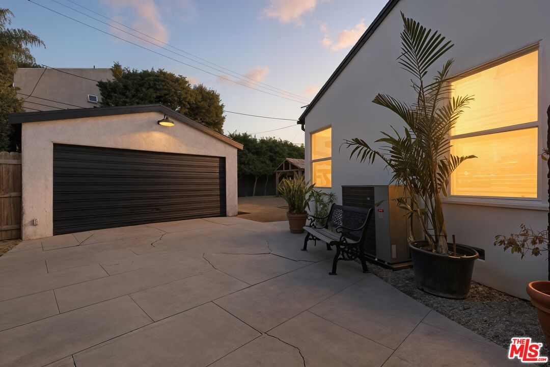 2560 Cotner Avenue Los Angeles, CA 90064 - Photo 15 of 20 a view of backyard with wheel chair and potted plants