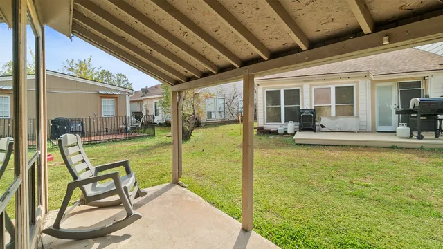 a view of living room with floor to ceiling window and floor to ceiling window