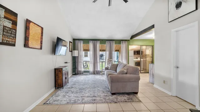 a living room with furniture and a couch