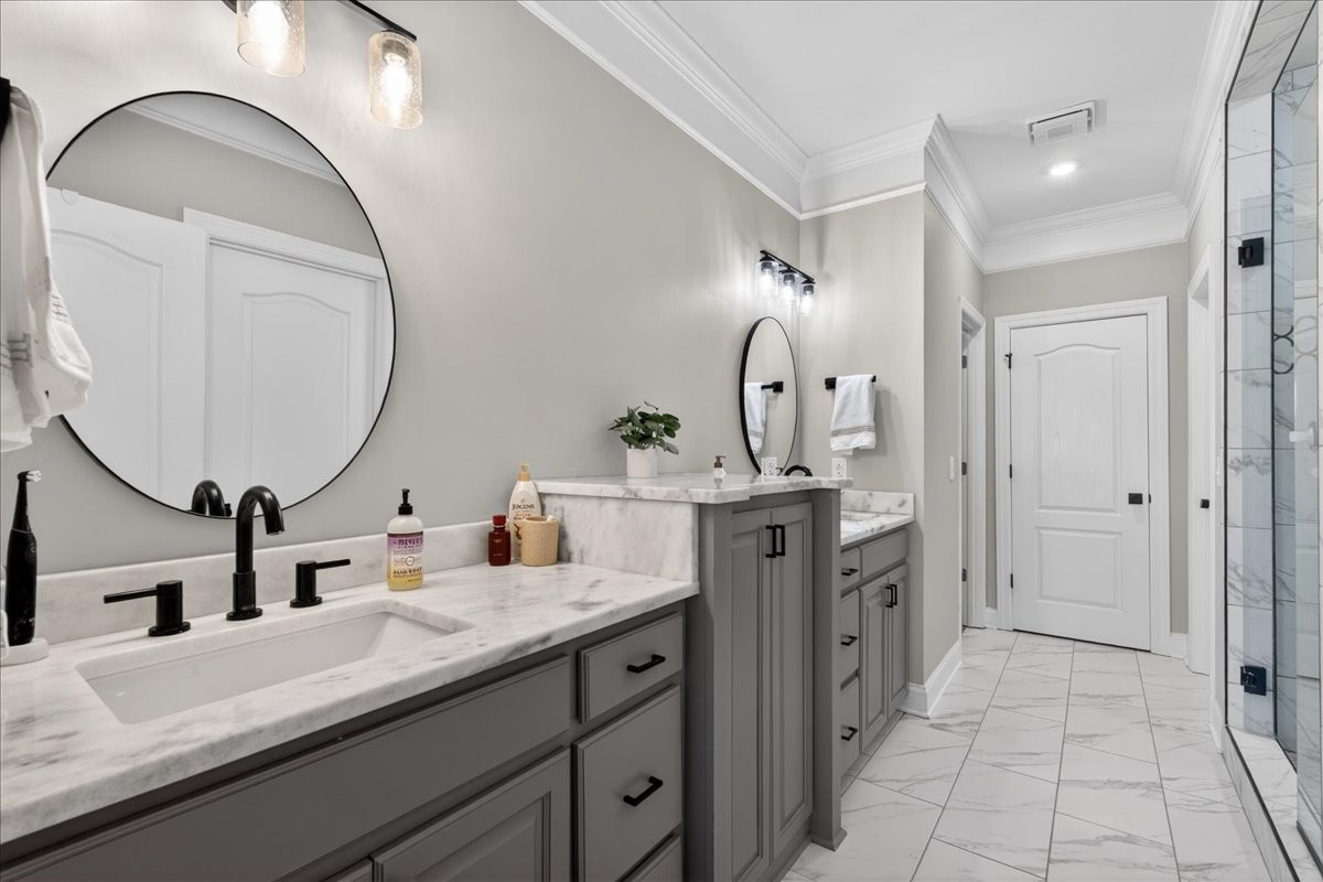 11039 Panther Creek Road Christiana, TN 37037 - Photo 25 of 76 a spacious bathroom with a double vanity sink and a mirror