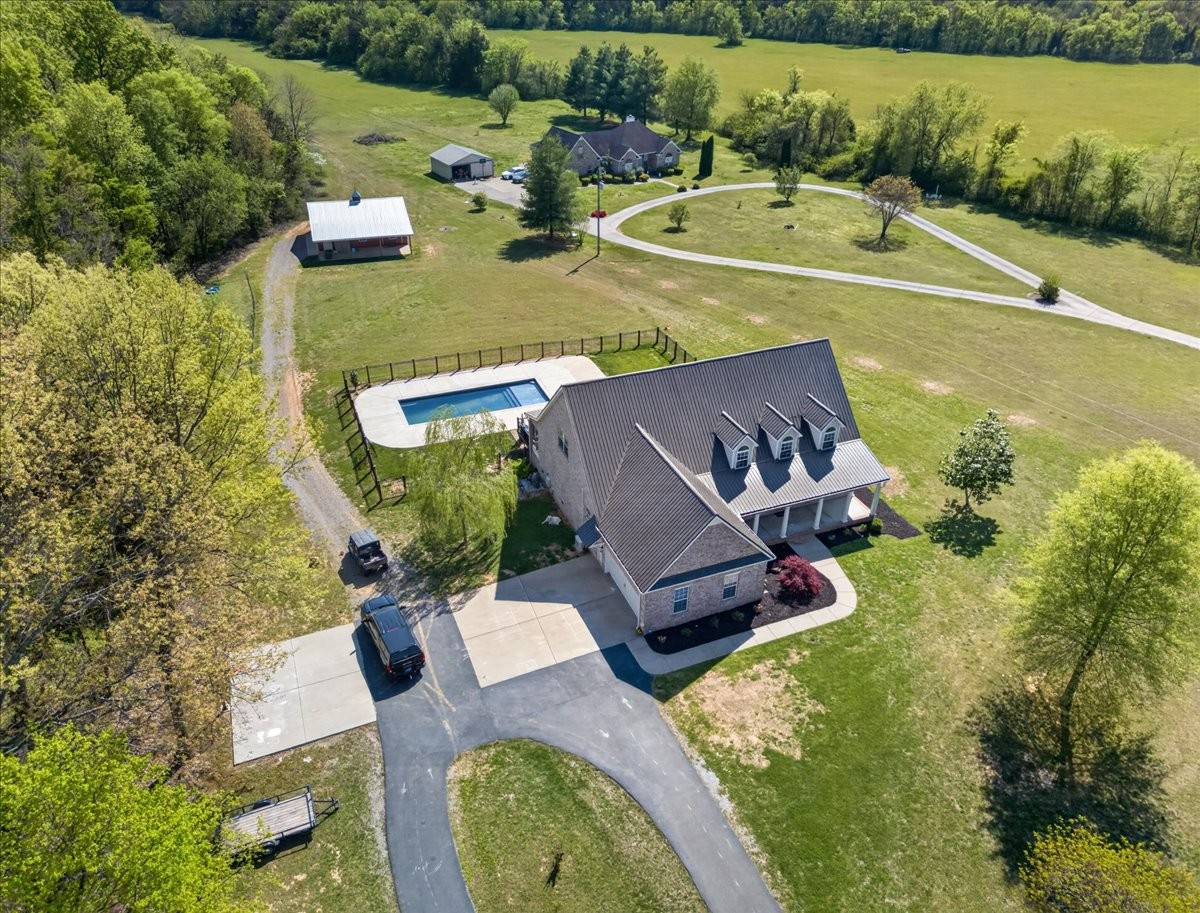 11039 Panther Creek Road Christiana, TN 37037 - Photo 74 of 76 an aerial view of a house with outdoor space patio and swimming pool