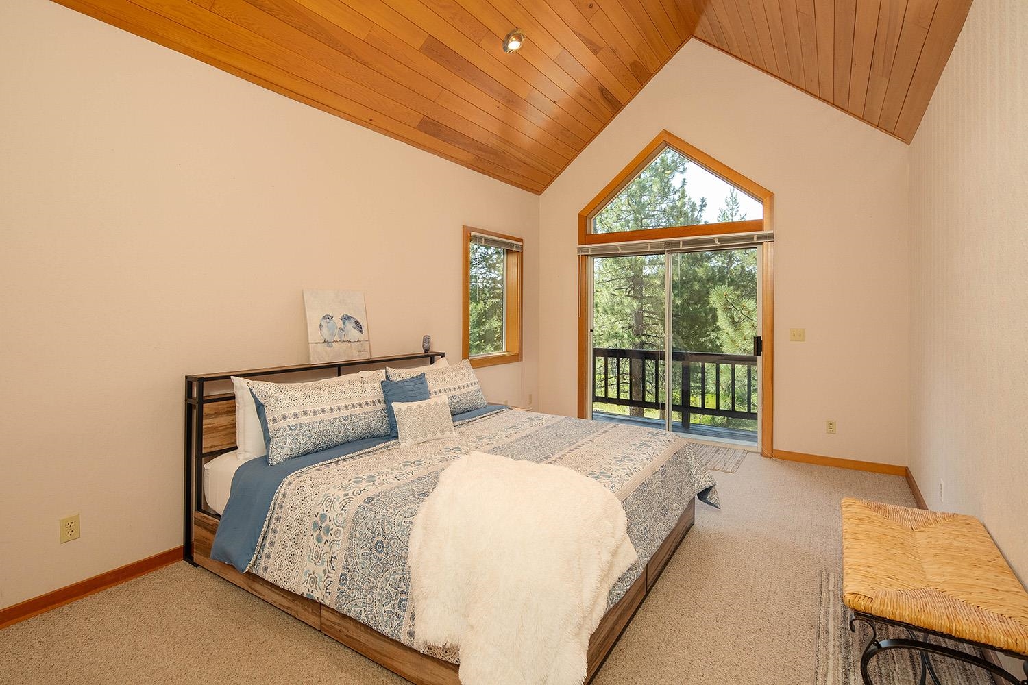 11904 Bennett Flat Road Truckee, CA 96161 - Photo 14 of 21 a bed sitting in a bedroom next to a window