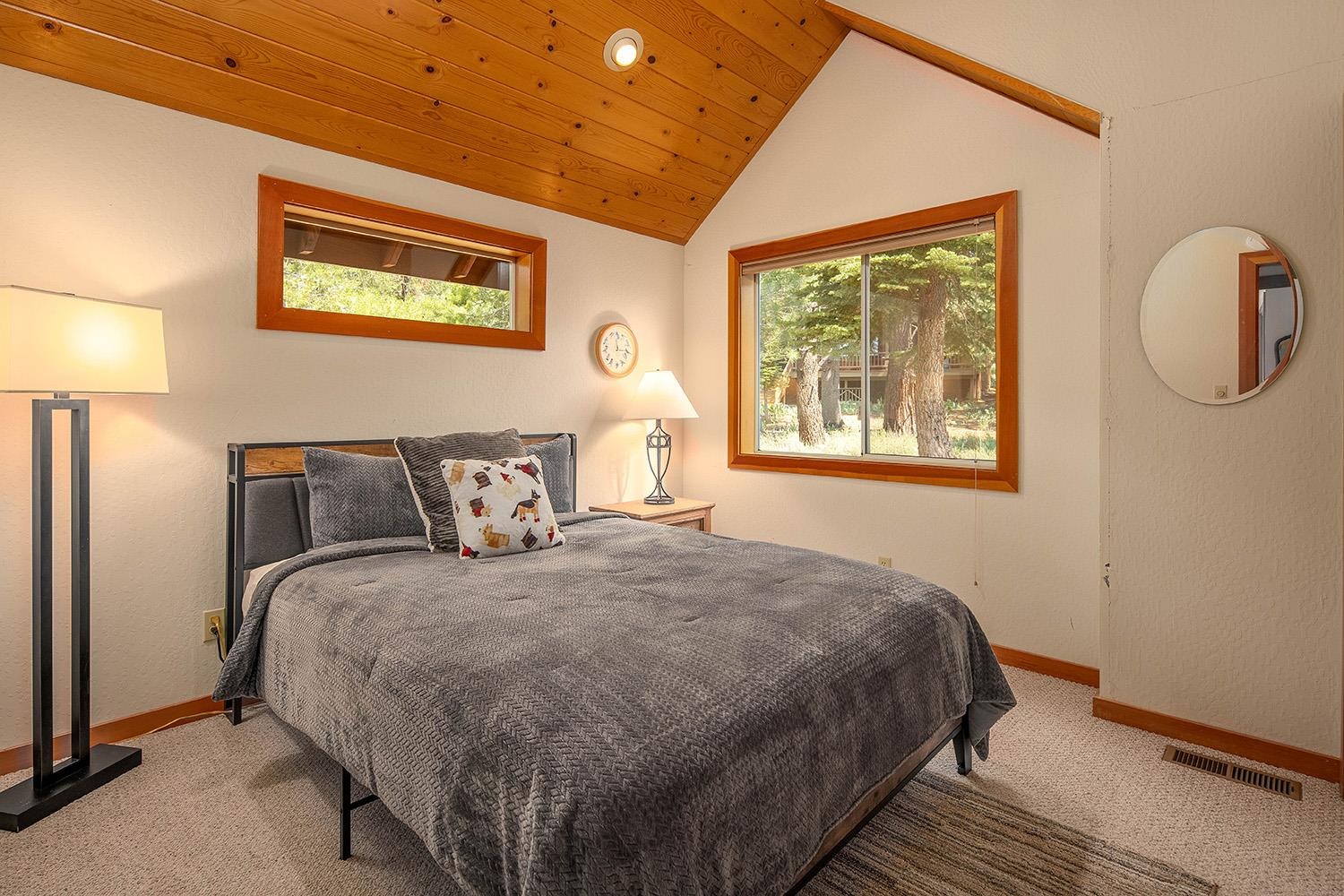 11904 Bennett Flat Road Truckee, CA 96161 - Photo 17 of 21 a bedroom with bed and a window