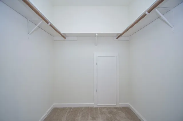 a view of an empty walk in closet